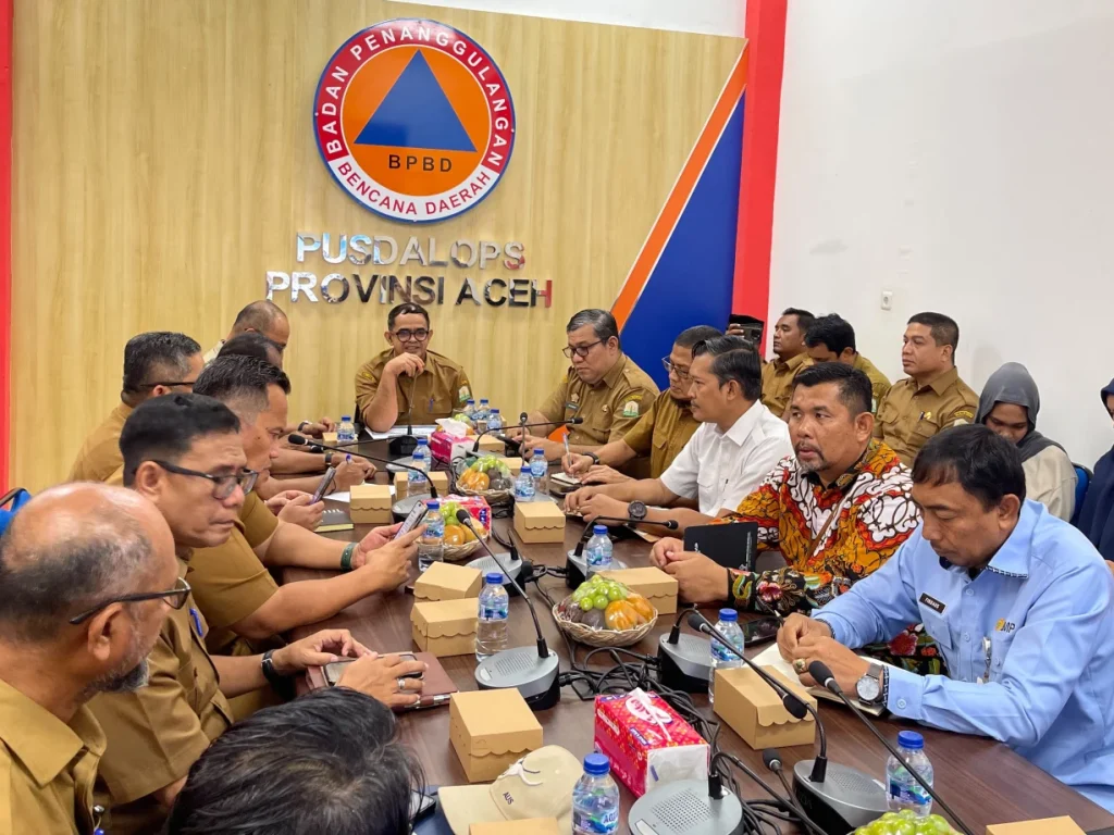 Pertemuan berlangsung di Gedung Pusdalops BPBA, Selasa (8/9/2026), dihadiri Plt Sekda Aceh Taufik, Asisten Sekda Aceh Bidang Perekonomian dan Pembangunan T Robby Irza, sejumlah kepala SKPA terkait